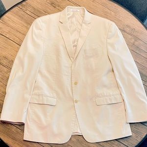 Calvin Klein men suit jacket in cream/beige color and size XL.